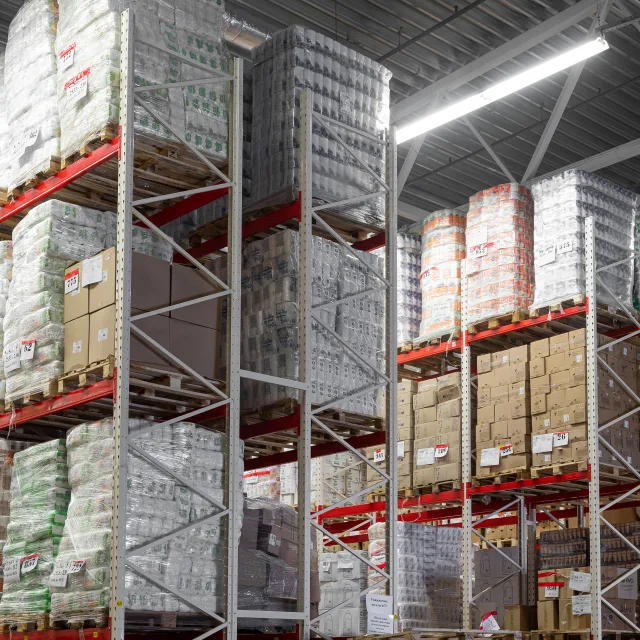 Large warehouse storage center indicating partnership support